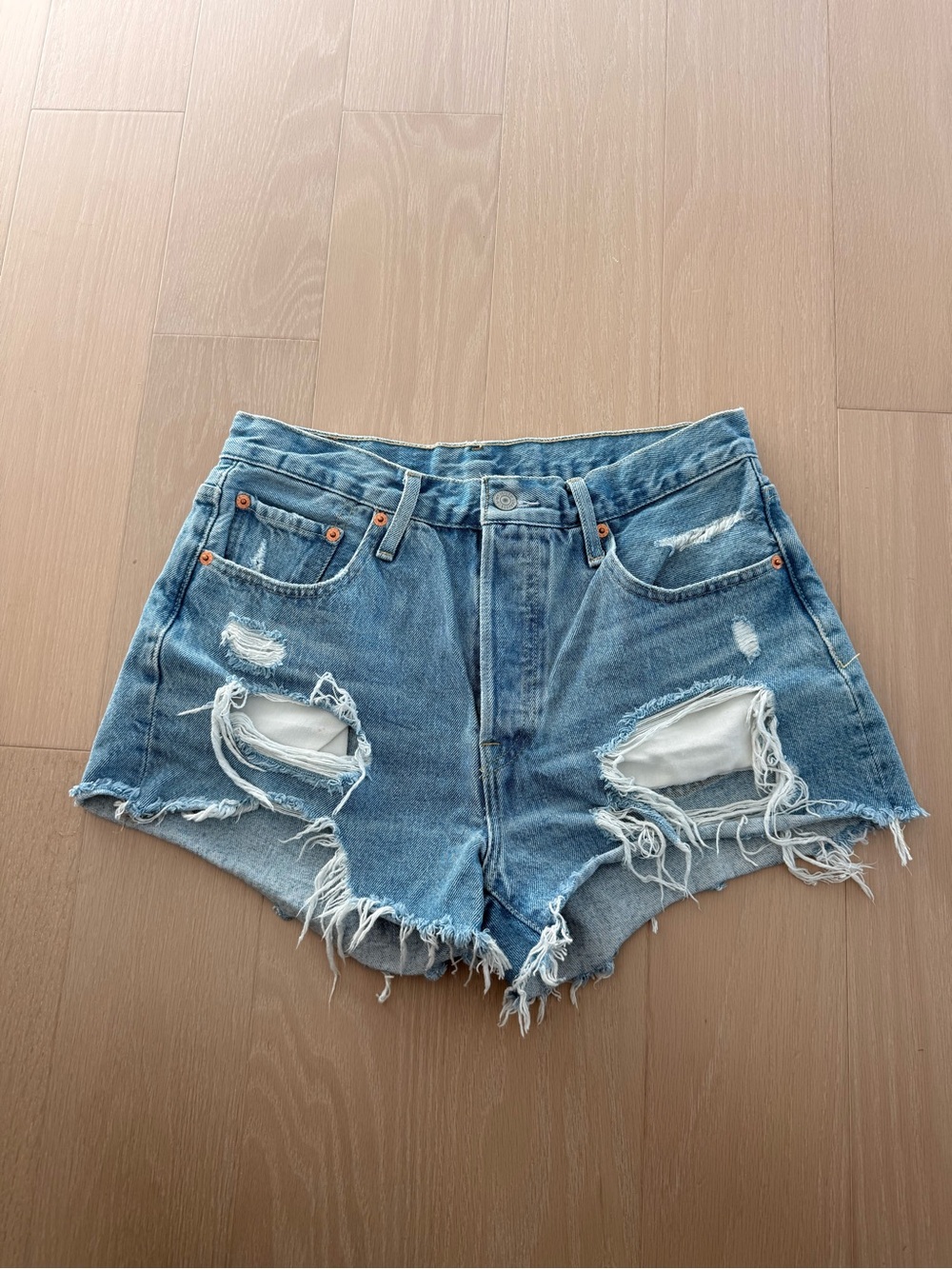 Levi's Distressed Light Blue High-Rise Denim Shorts
